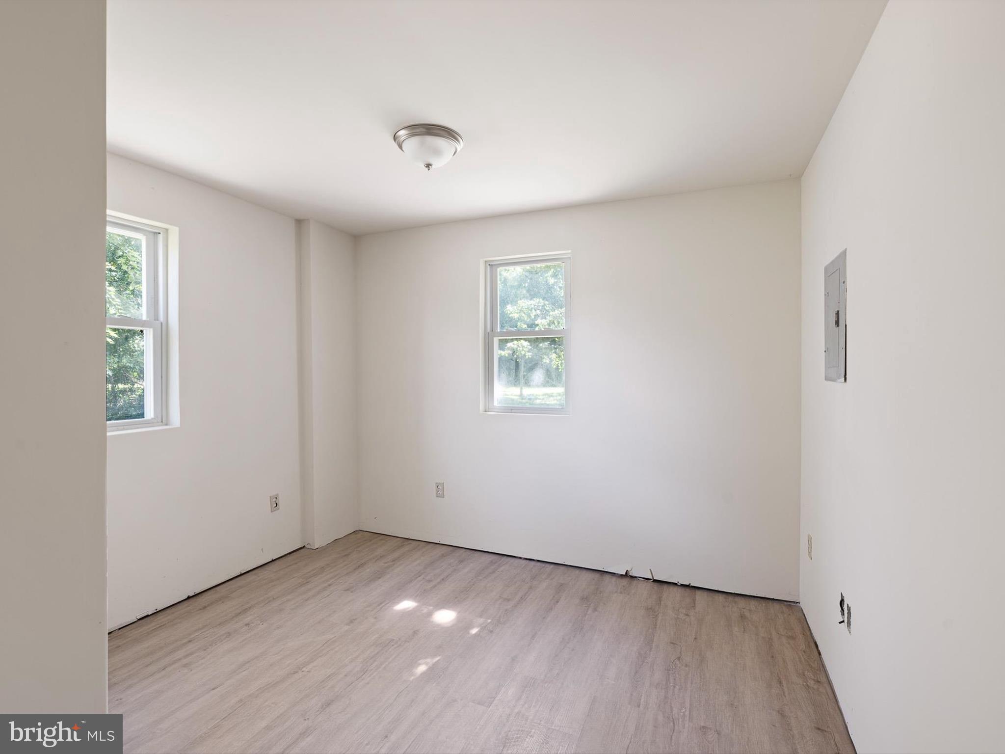 16327 Old Mill Road Lewes, DE 19958 - Photo 10 of 35 an empty room with a window