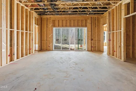 a view of a room with large windows