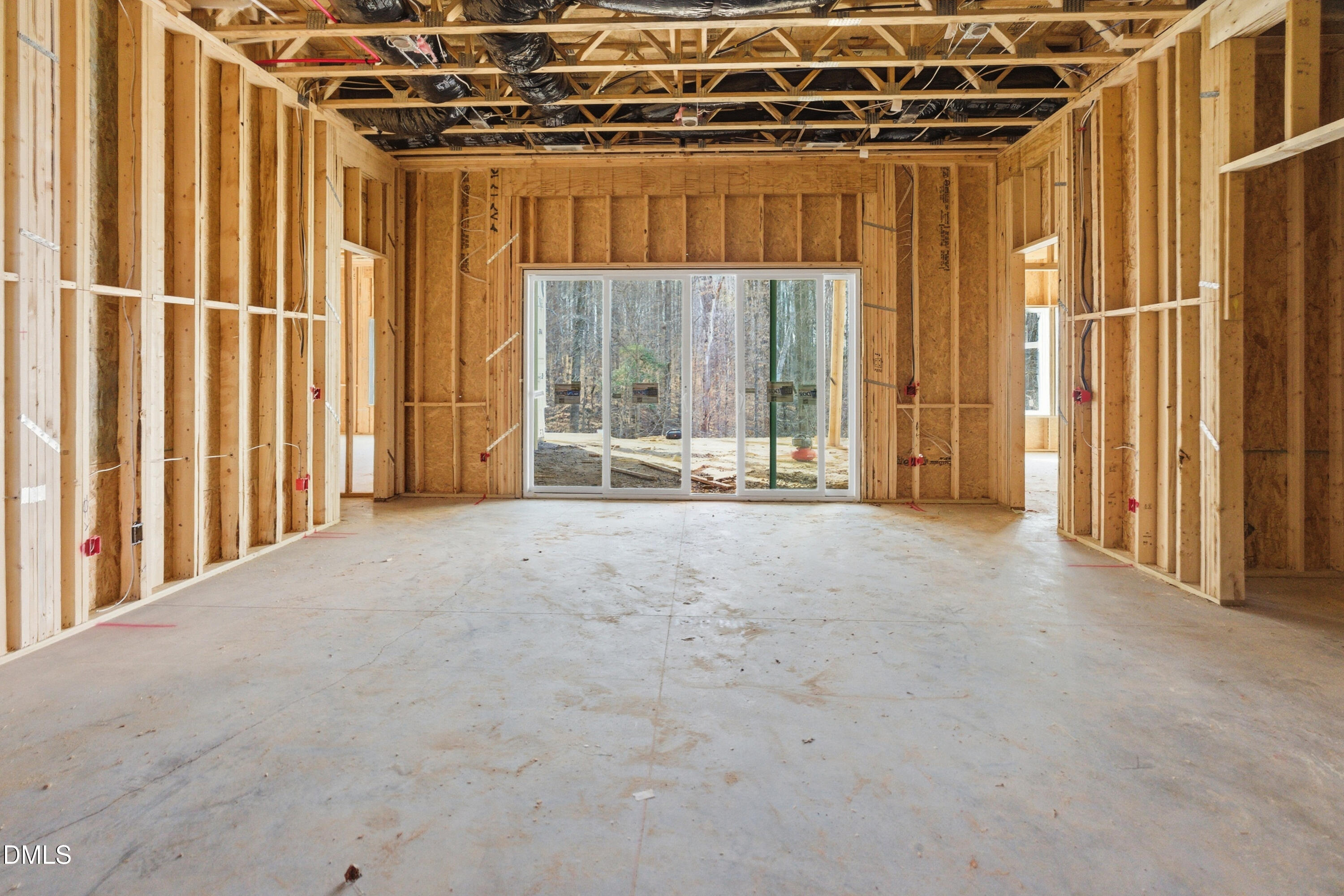 1725 Legacy Ridge Lane Wake Forest, NC 27587 - Photo 8 of 14 a view of a room with large windows