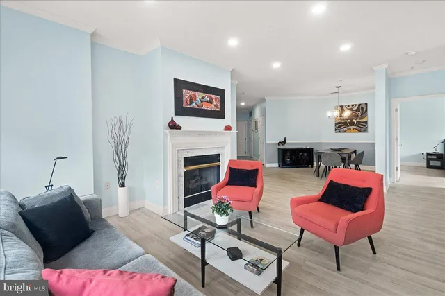 a kitchen with stainless steel appliances a refrigerator sink and microwave