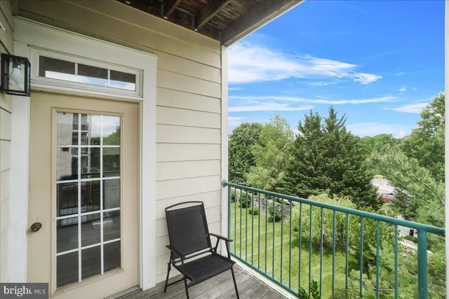 a view of outdoor space with signage and flags