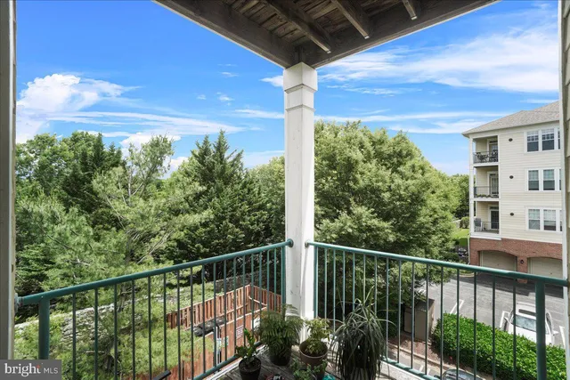 a view of house with outdoor space and seating area