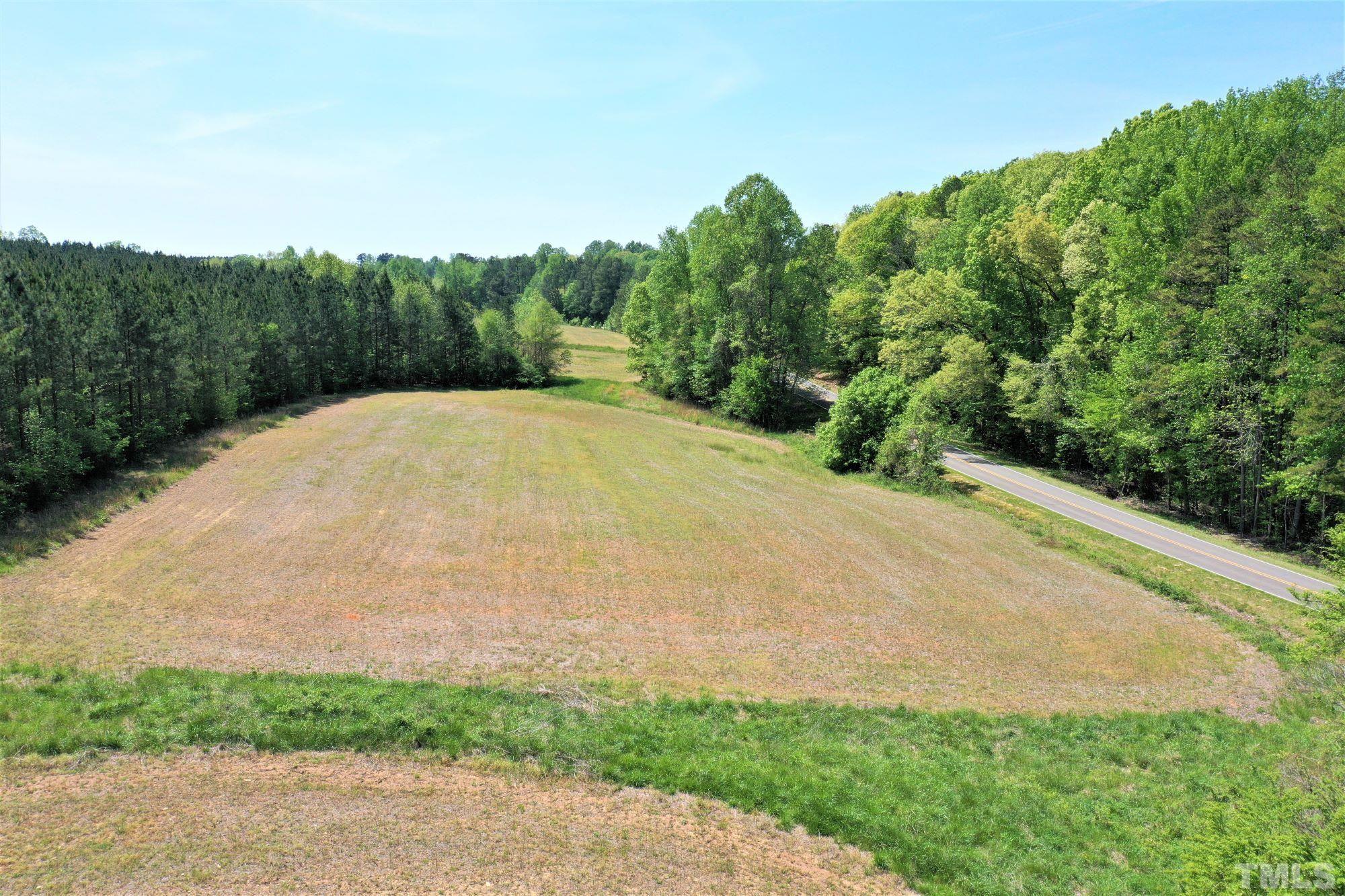 4170 Old Allensville Road Roxboro, NC 27574 - Photo 4 of 11 a view of a backyard of a house