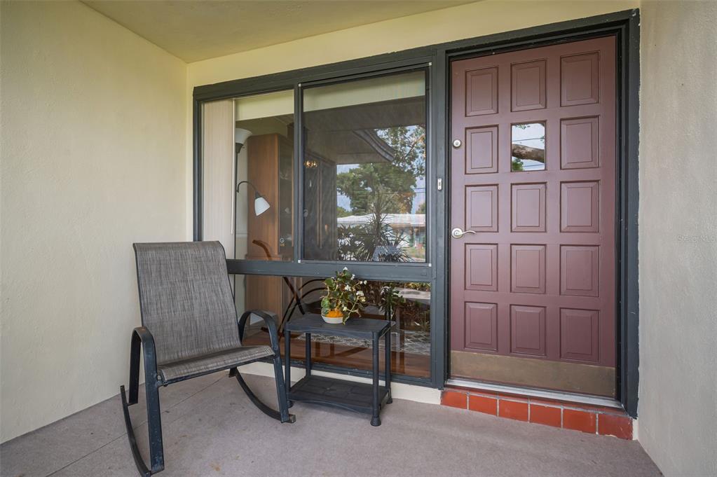 409 Graham Drive Clearwater, FL 33765 - Photo 17 of 75 a dining room with furniture and window