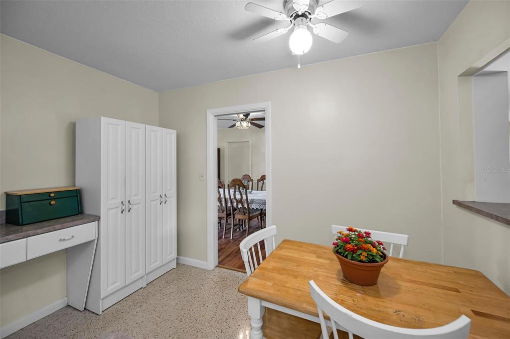 409 Graham Drive Clearwater, FL 33765 - Photo 31 of 75 a dining room with furniture and wooden floor