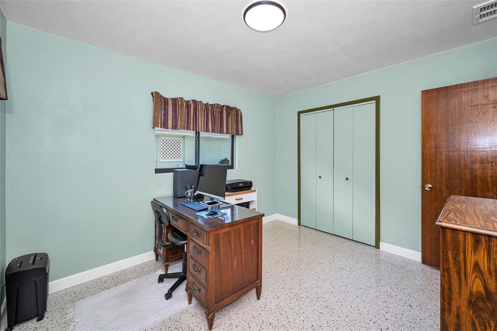409 Graham Drive Clearwater, FL 33765 - Photo 49 of 75 a view of workspace with wooden floor