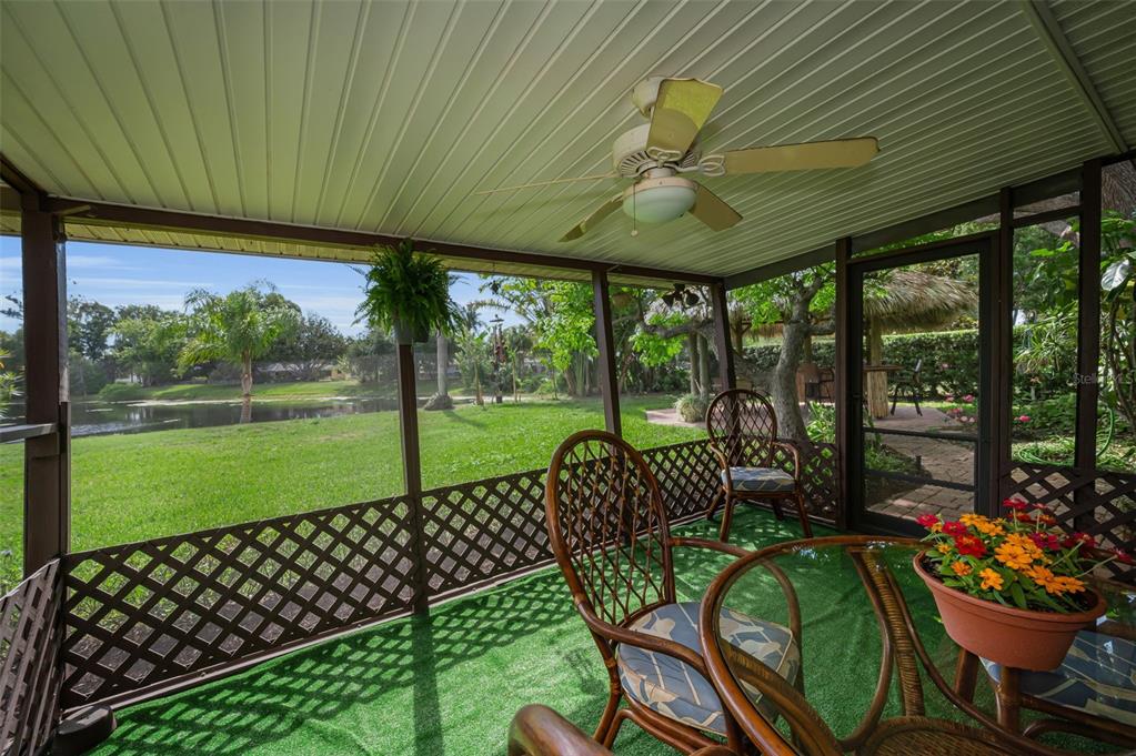409 Graham Drive Clearwater, FL 33765 - Photo 51 of 75 a view of a porch with furniture and garden