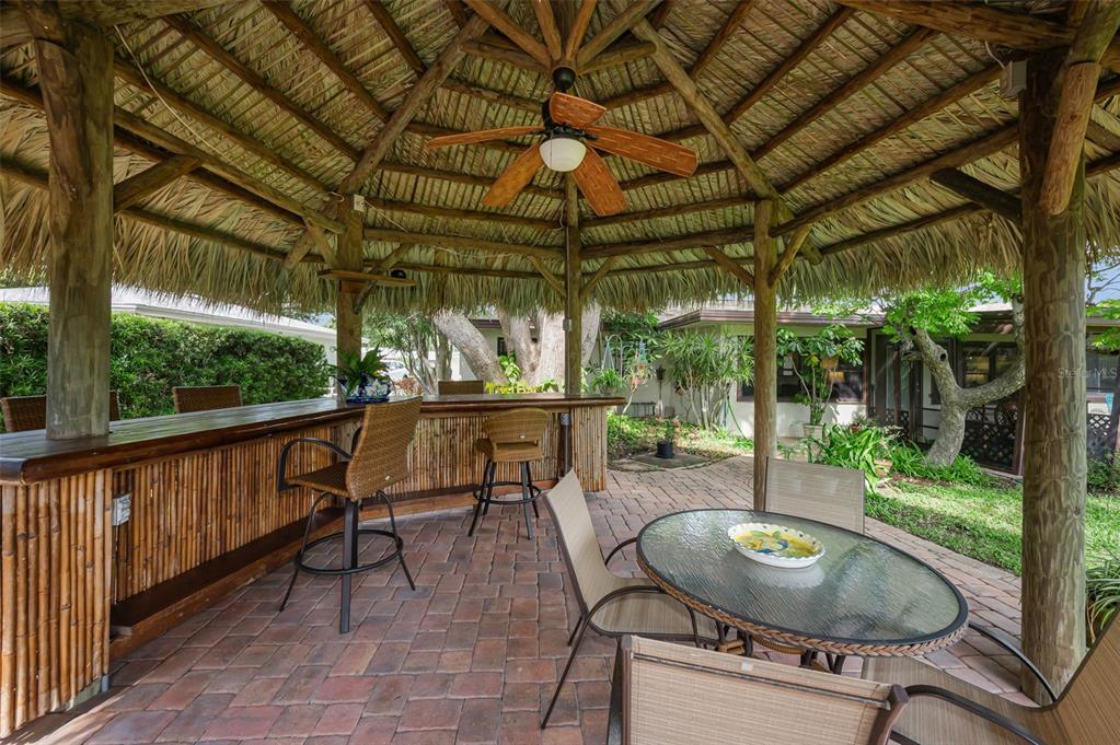 409 Graham Drive Clearwater, FL 33765 - Photo 59 of 75 a view of a chairs and tables in the patio