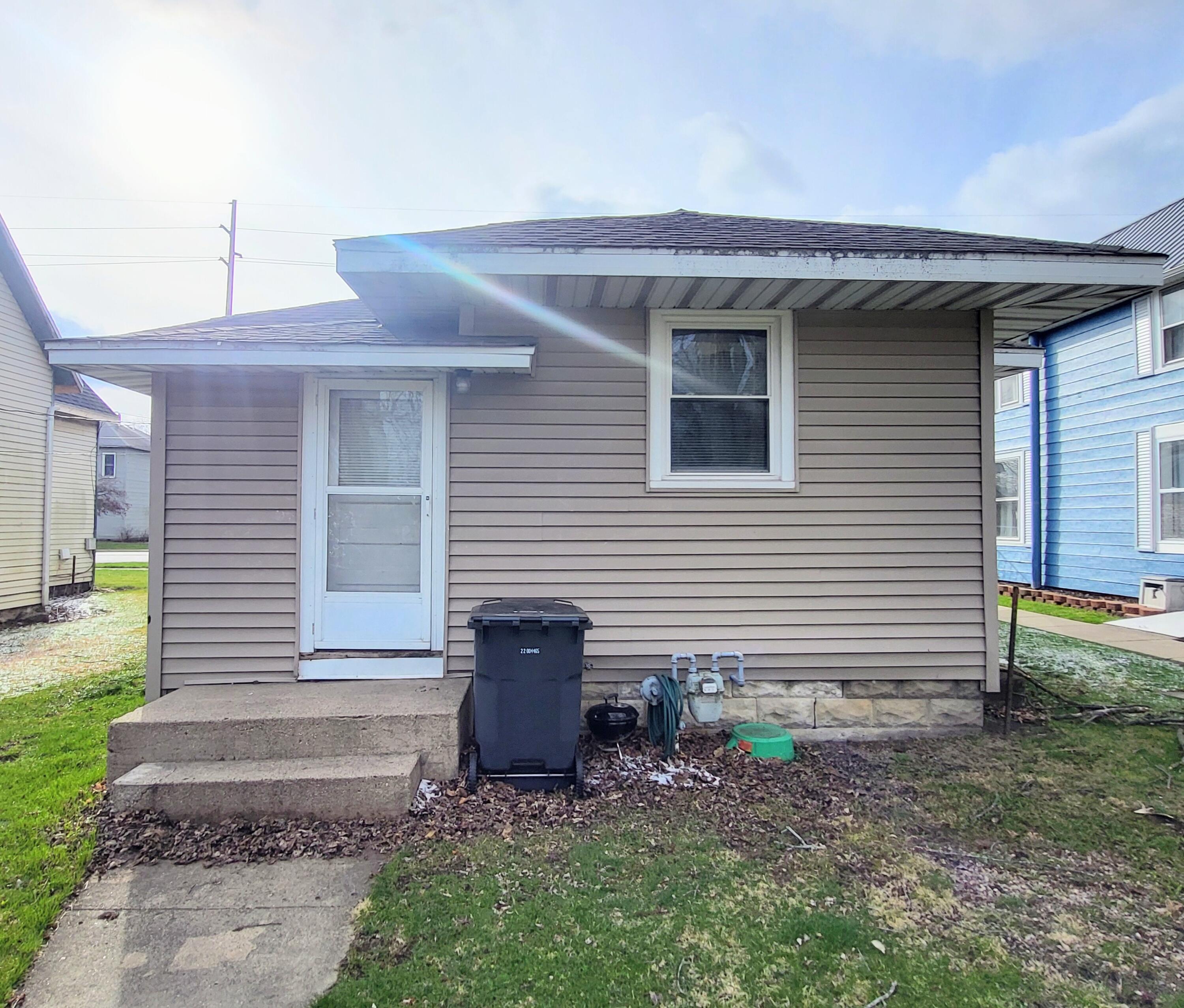509 North Cullen Street Rensselaer, IN 47978 - Photo 3 of 16 a view of a house with a backyard
