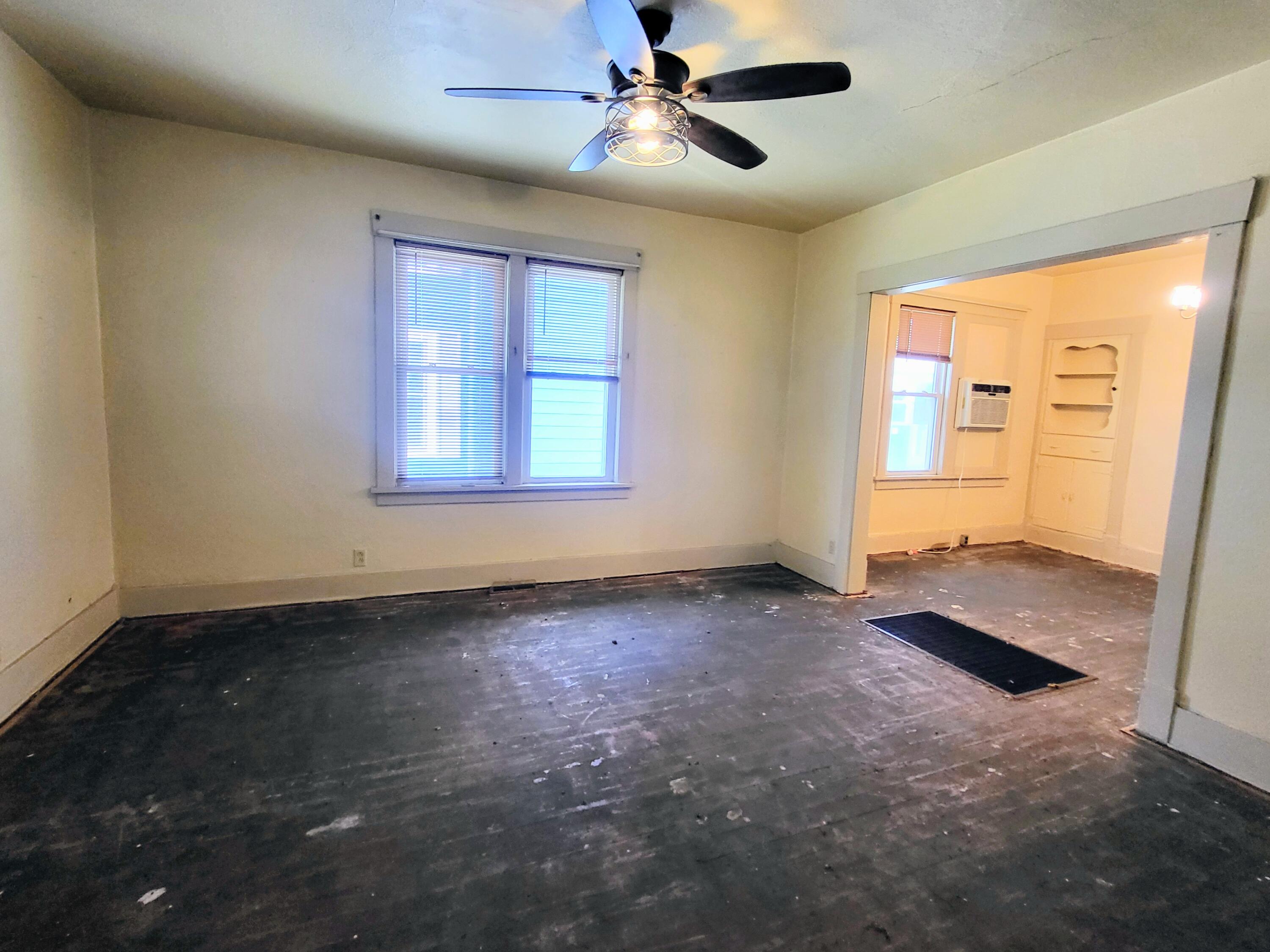 509 North Cullen Street Rensselaer, IN 47978 - Photo 10 of 16 a view of a livingroom with a ceiling fan and window
