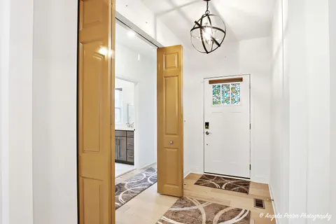 a bathroom with a mirror and a shower