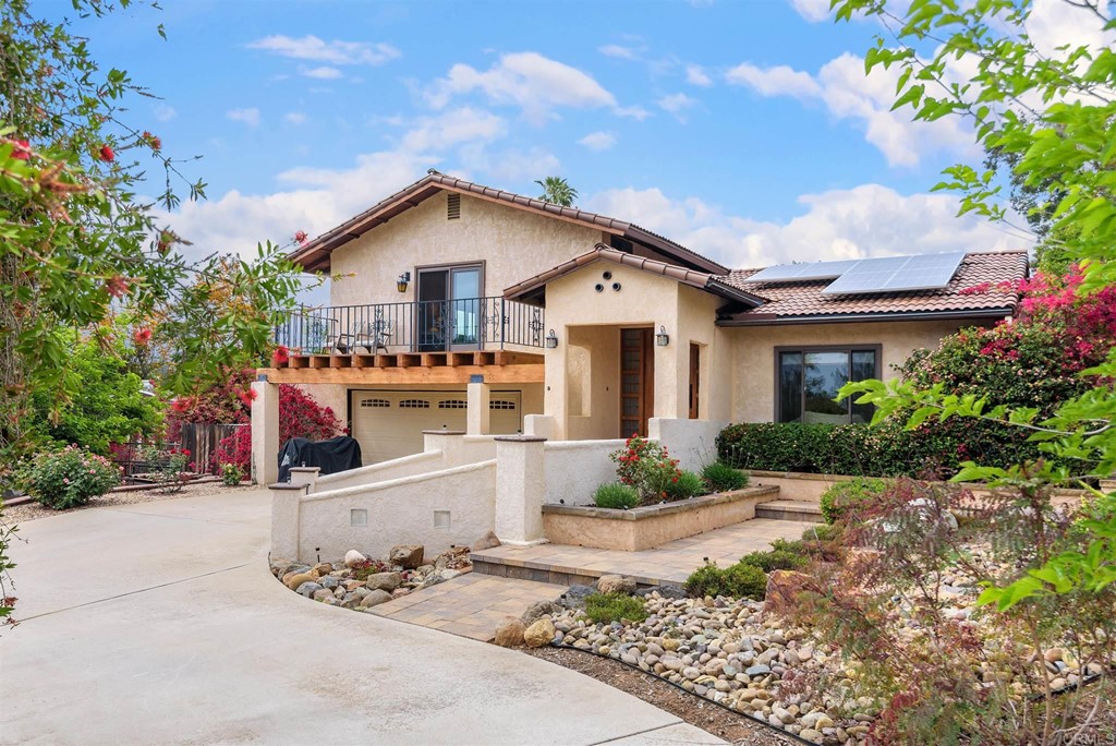14332 Mountain Road Poway, CA 92064 - Photo 1 of 1 a view of a house with a yard and potted plants