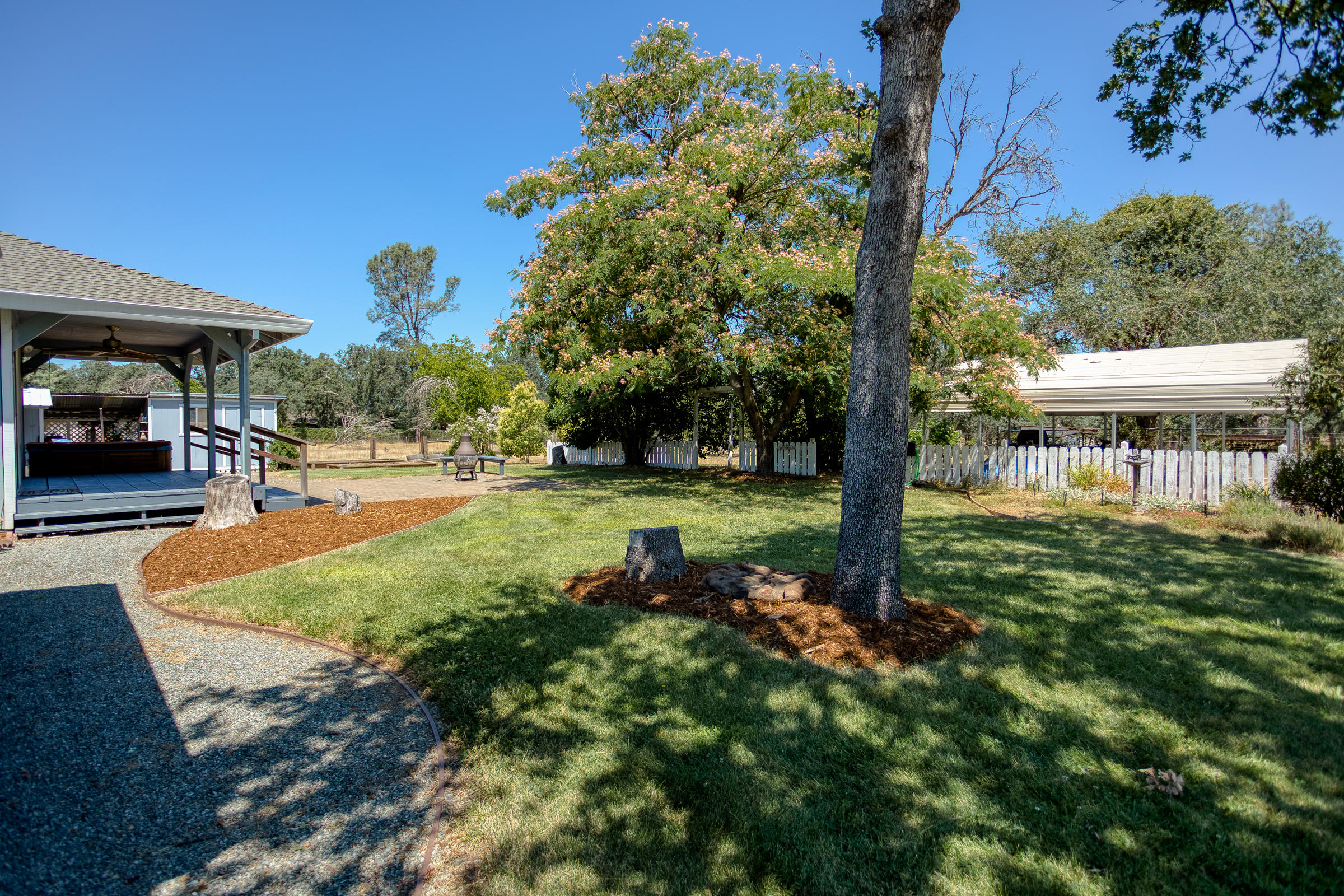 21442 Valley Oak Road Redding, CA 96003 - Photo 26 of 41 nice back landscaping, auto sprinklers