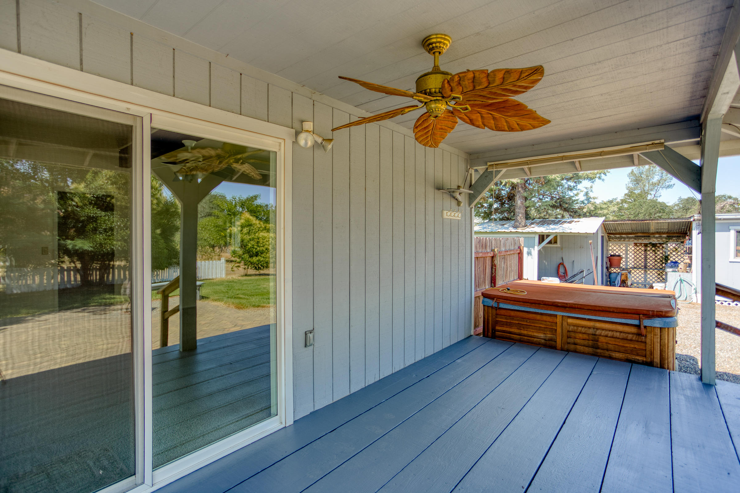 21442 Valley Oak Road Redding, CA 96003 - Photo 29 of 41 porch ceiling fan to stay cool