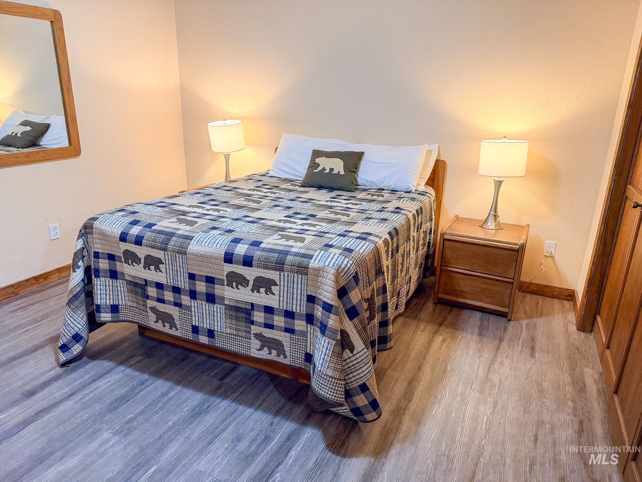 1630 Davis Avenue, Unit F46 McCall, ID 83638 - Photo 3 of 23 Bedroom with baseboards and wood finished floors