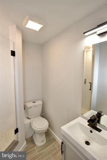 1608 North 3rd Street Philadelphia, PA 19122 - Photo 22 of 28 a bathroom with a sink toilet and shower