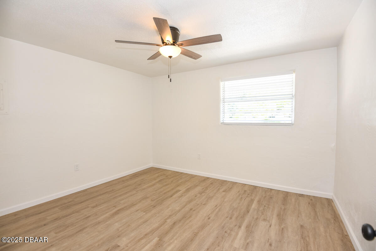 406 Oak Street Port Orange, FL 32127 - Photo 28 of 31 Primary Bedroom