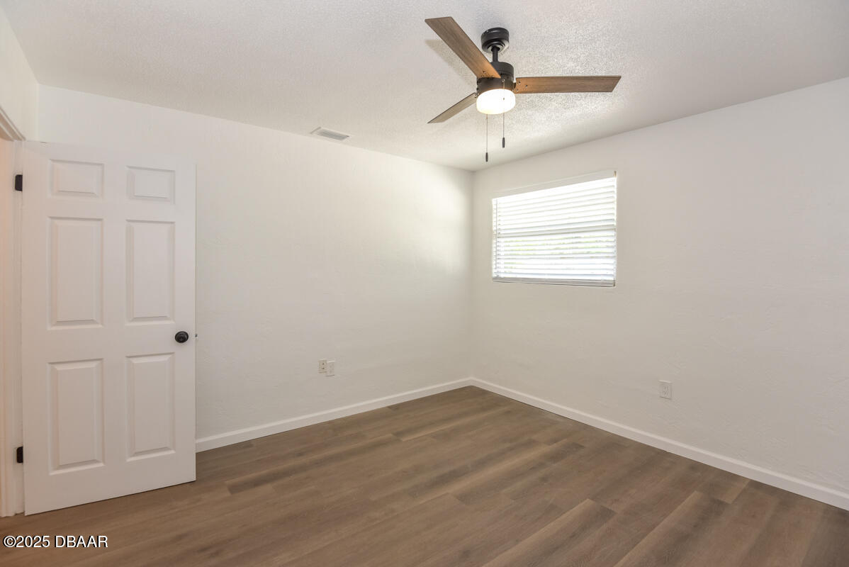 406 Oak Street Port Orange, FL 32127 - Photo 8 of 31 Primary Bedroom