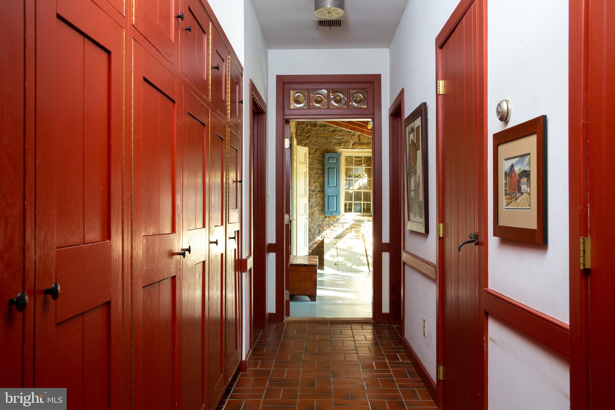 2666 Mill Road Doylestown, PA 18902 - Photo 6 of 78 Hallway to porch and multiple storage closets