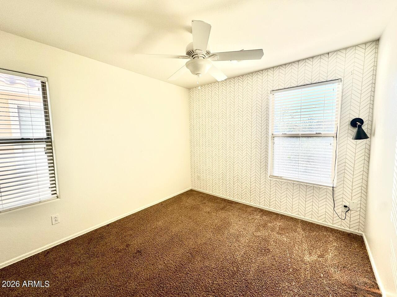 3555 East Michelle Way Gilbert, AZ 85234 - Photo 13 of 18 a view of an empty room with a window