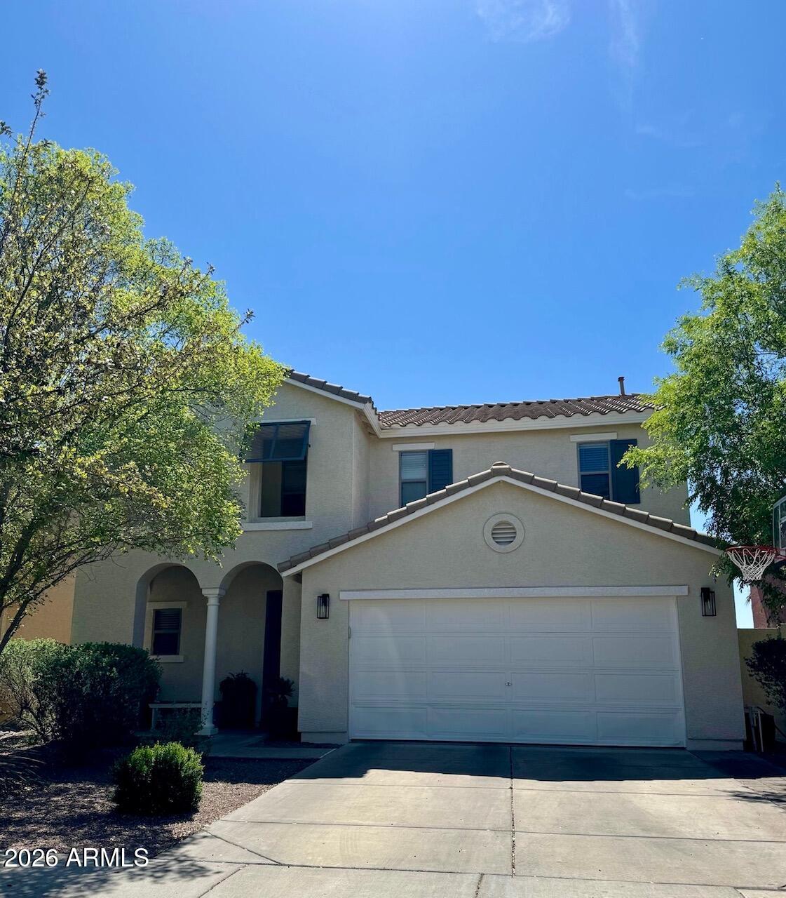 3555 East Michelle Way Gilbert, AZ 85234 - Photo 4 of 18 a view of a house with a yard
