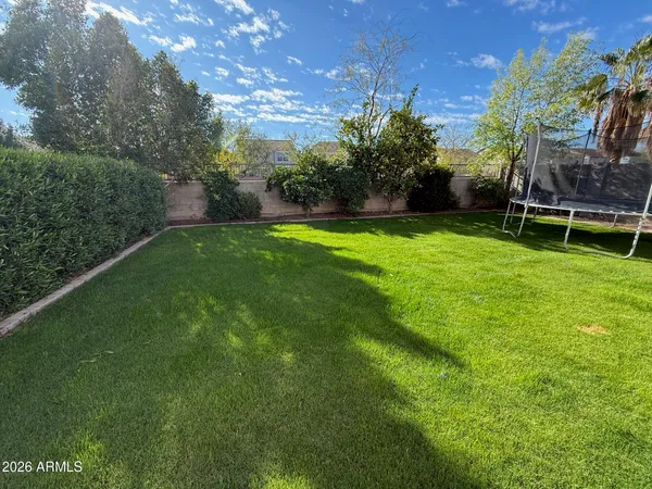 a view of a backyard with a garden