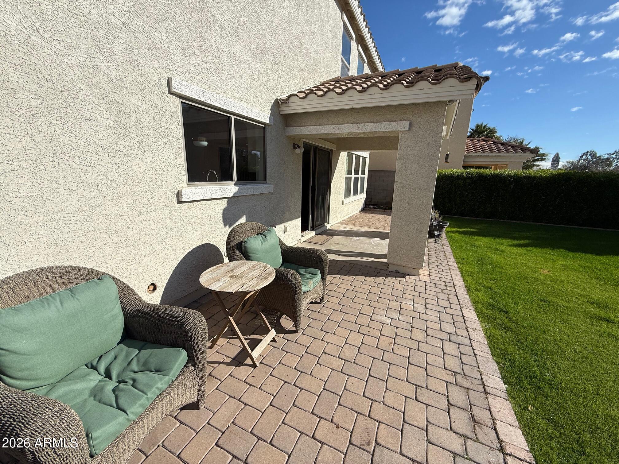 3555 East Michelle Way Gilbert, AZ 85234 - Photo 9 of 18 a view of a patio with chairs and a table