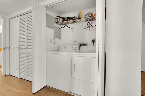 a utility room with dryer and washer