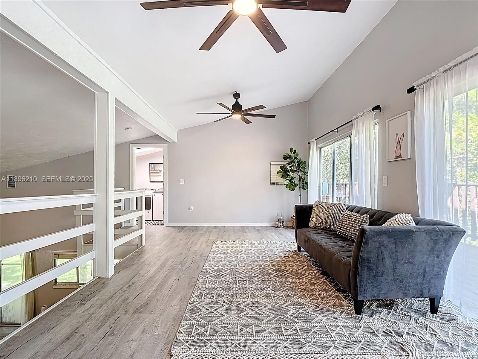 1270 Tom Coker Road LaBelle, FL 33935 - Photo 16 of 46 a living room with furniture and a window