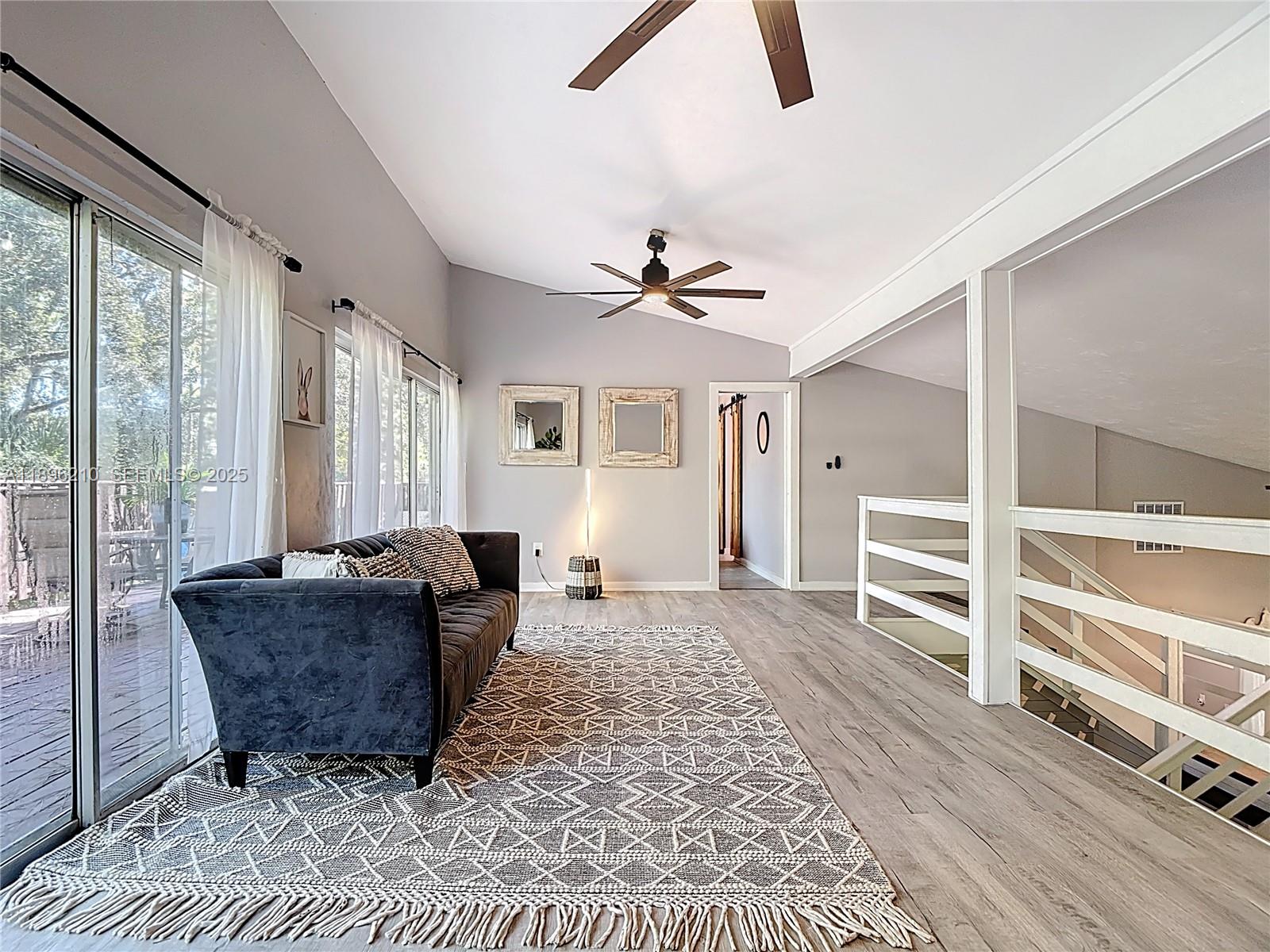 1270 Tom Coker Road LaBelle, FL 33935 - Photo 17 of 46 a living room with furniture rug and window