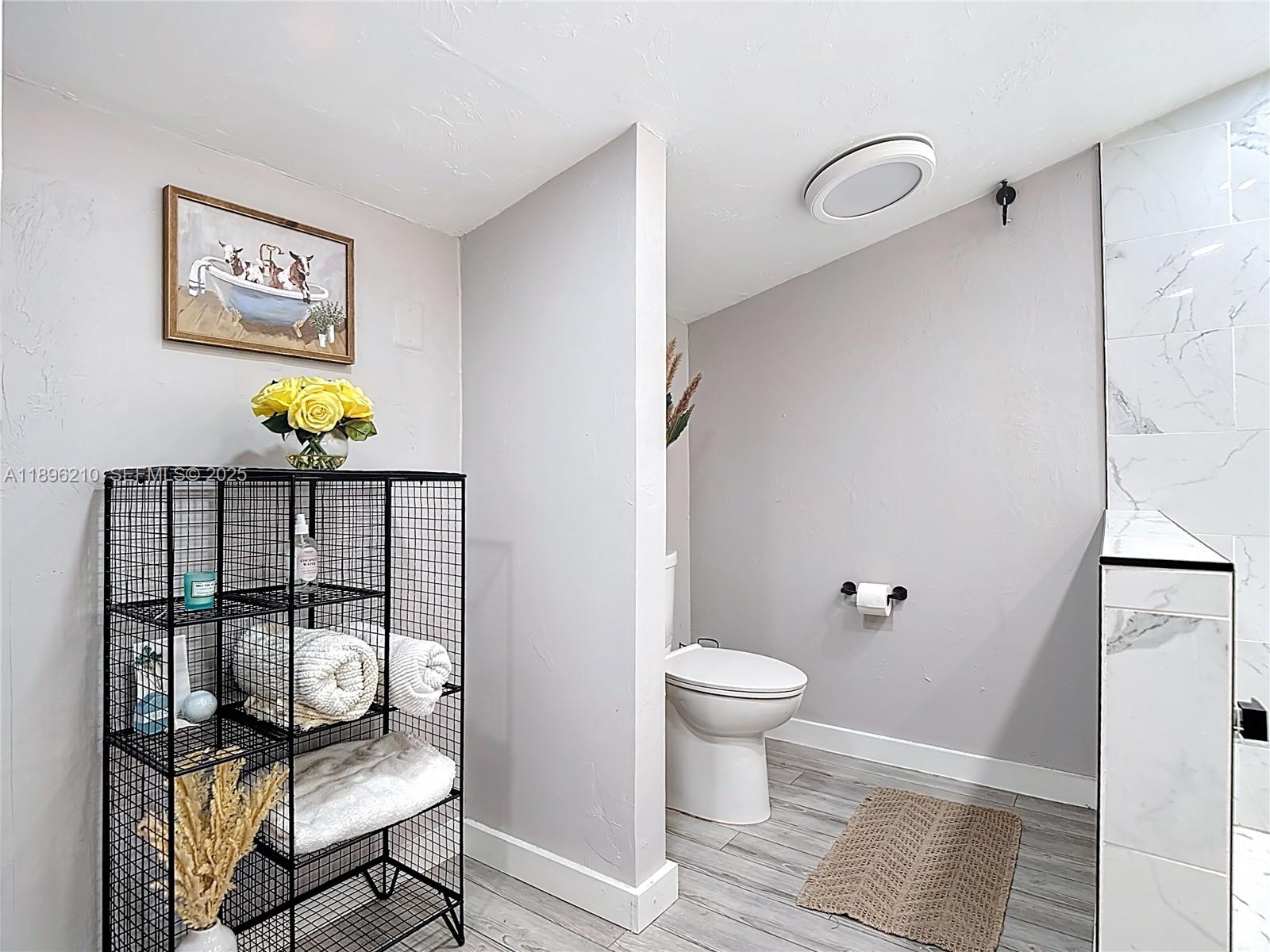 1270 Tom Coker Road LaBelle, FL 33935 - Photo 20 of 46 a bathroom with a toilet