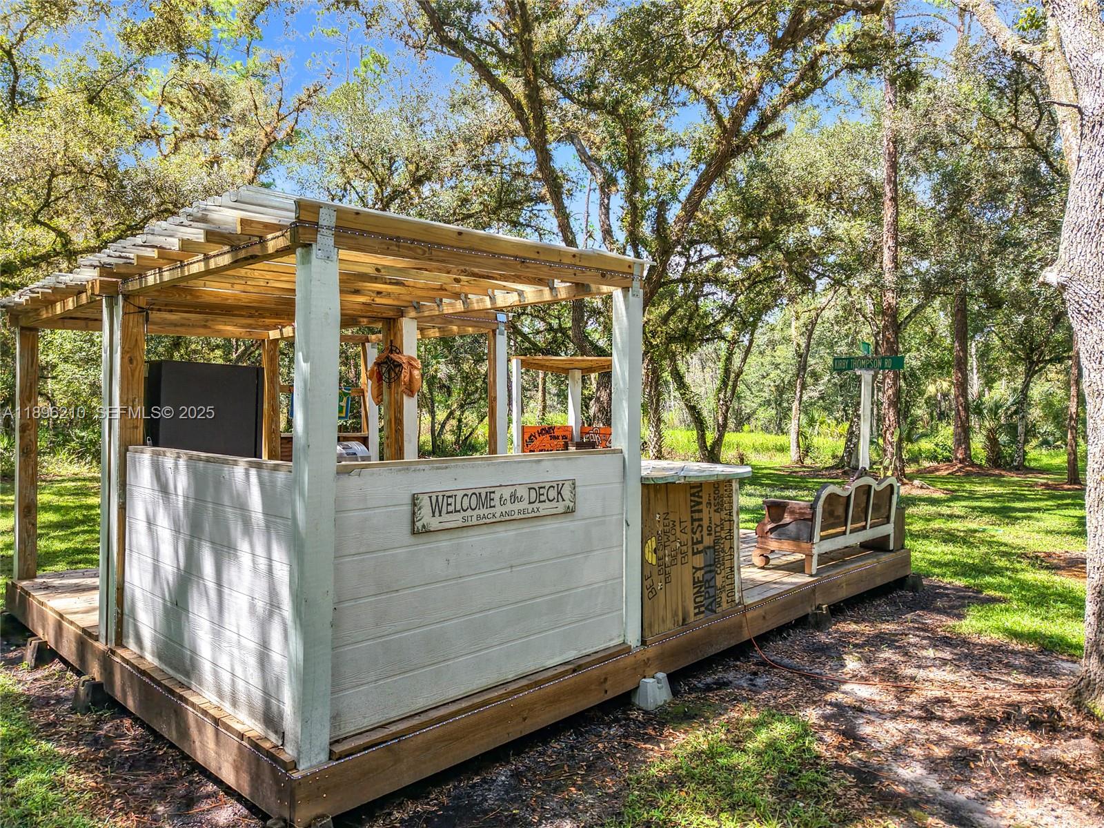 1270 Tom Coker Road LaBelle, FL 33935 - Photo 34 of 46 a view of a house with a yard
