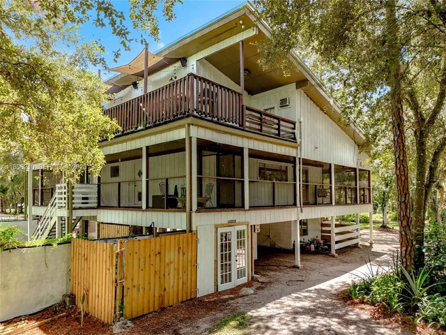 a view of a backyard with plants