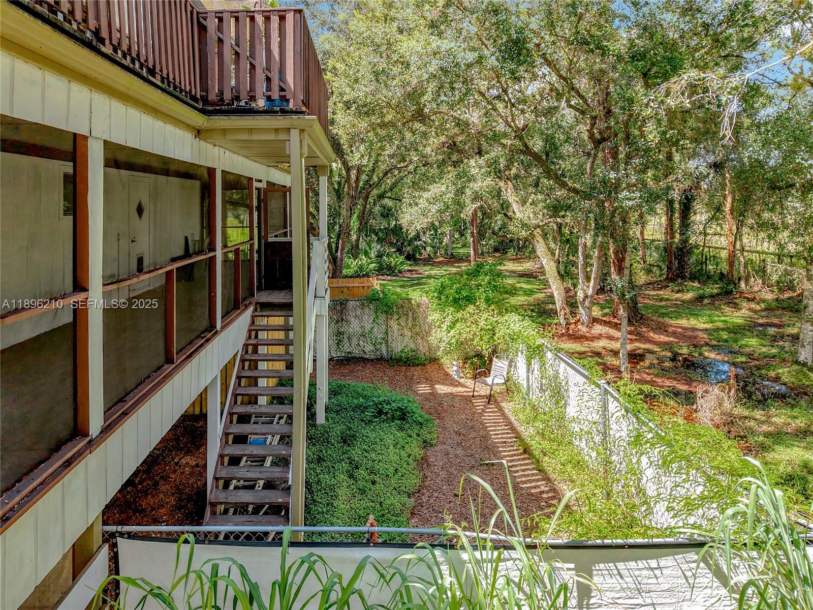 1270 Tom Coker Road LaBelle, FL 33935 - Photo 40 of 46 a view of a backyard with plants