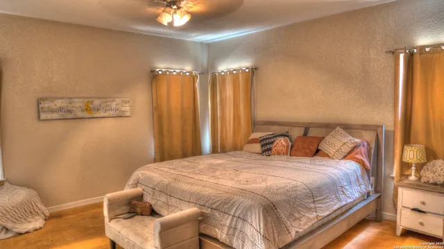 a black and white photo of a bench