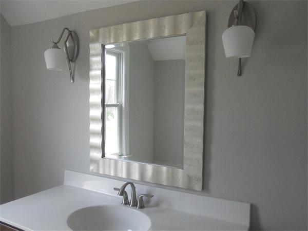 26 Sanctuary Lane, Unit 26 Hopkinton, MA 01748 - Photo 10 of 10 a bathroom with a sink a mirror and window