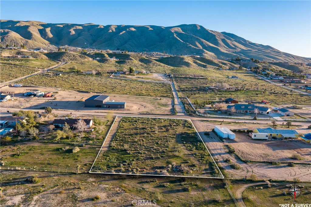 0 Moonbeam Apple Valley Apple Valley, CA 92308 - Photo 1 of 14 a view of a water with a mountain view