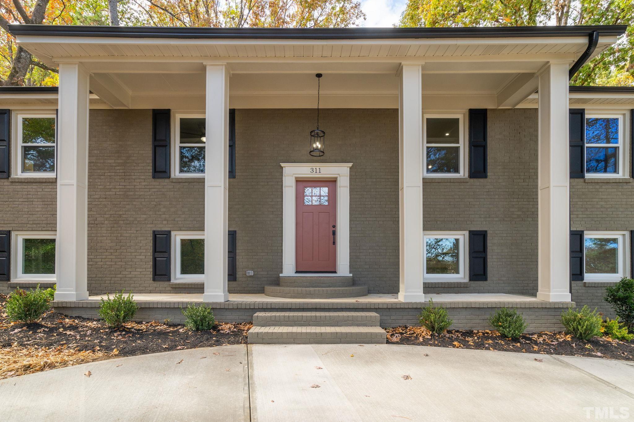 311 Lord Ashley Road Raleigh, NC 27610 - Photo 2 of 39 a front view of a house