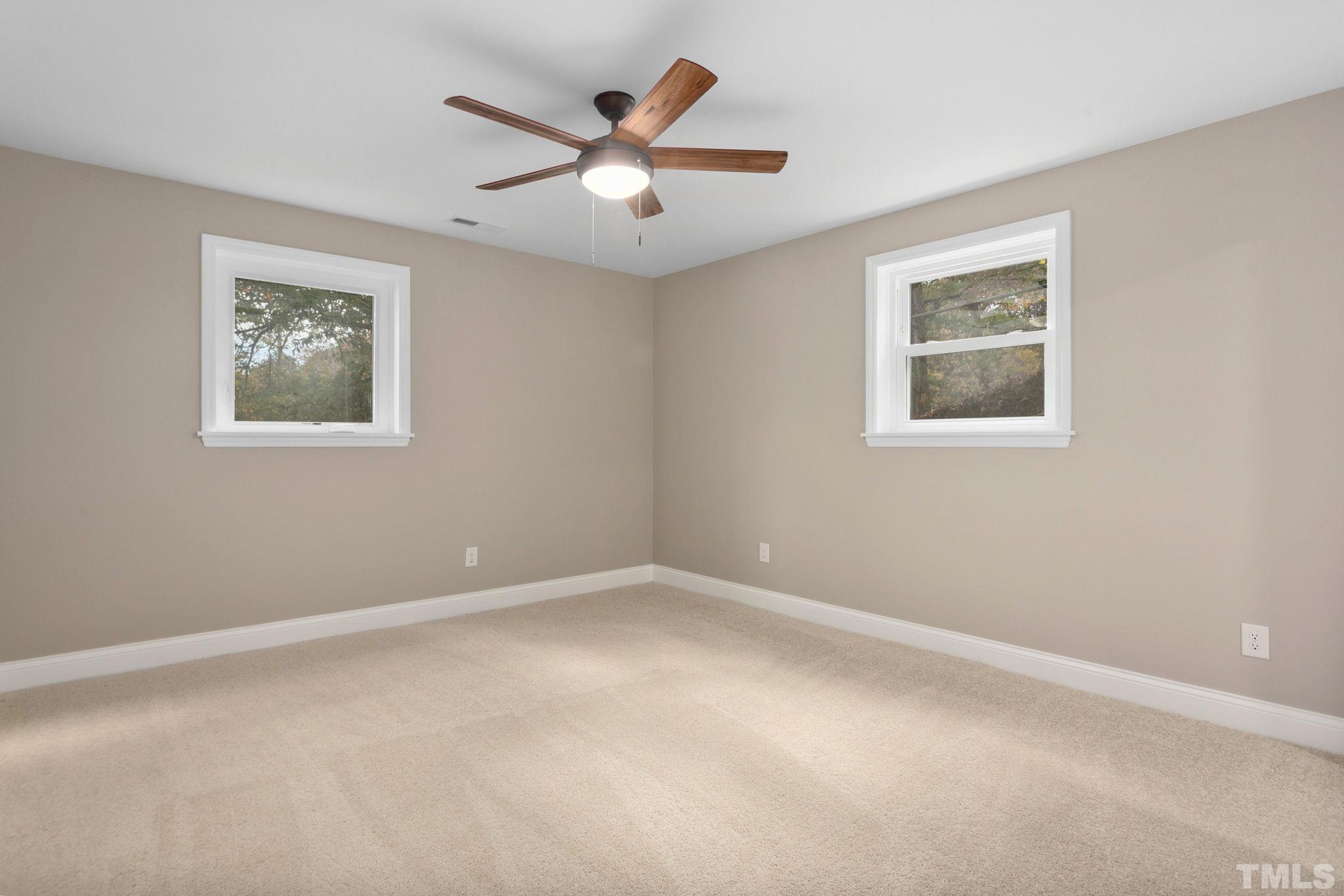 311 Lord Ashley Road Raleigh, NC 27610 - Photo 29 of 39 a view of an empty room with a window