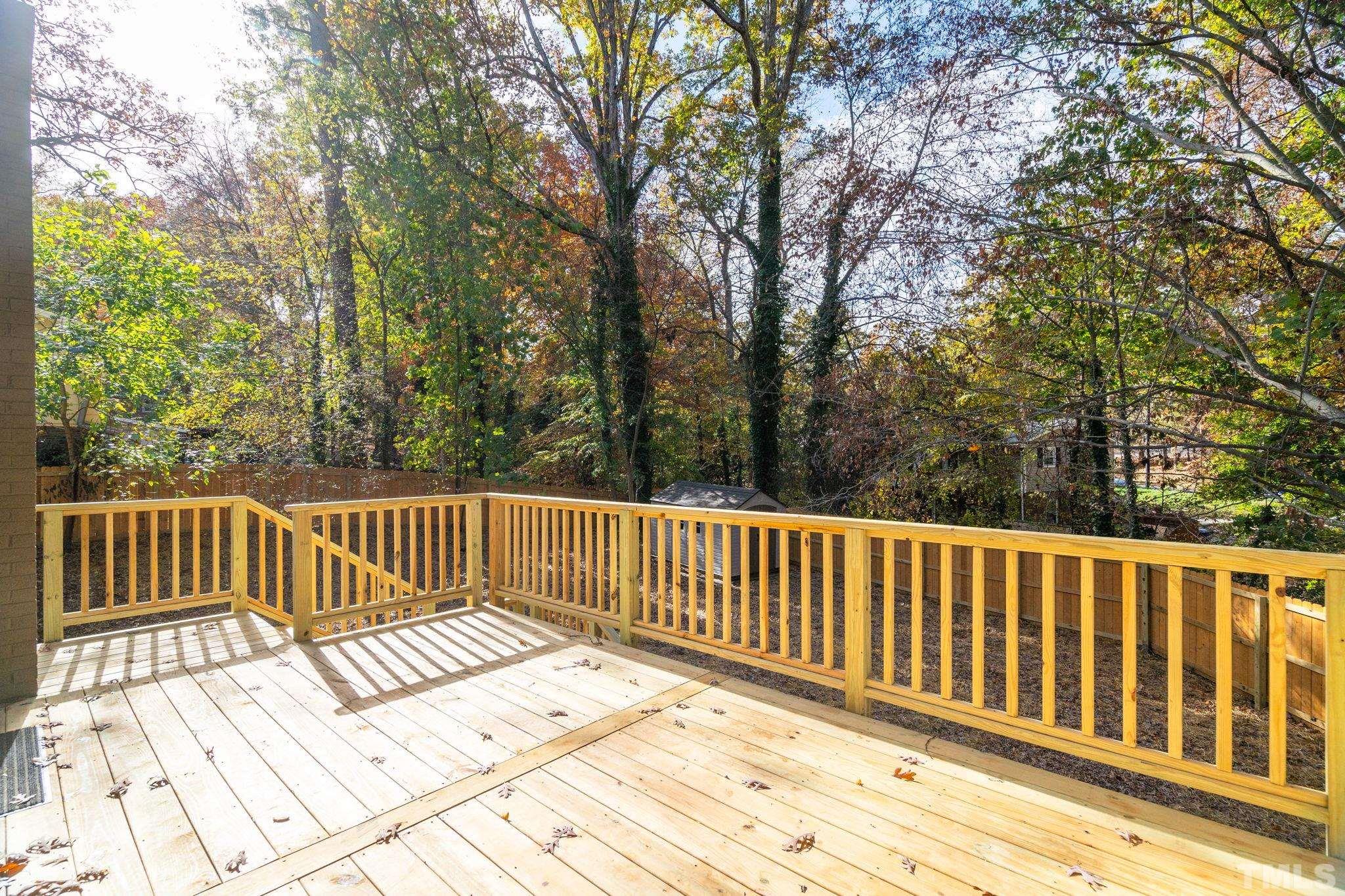 311 Lord Ashley Road Raleigh, NC 27610 - Photo 32 of 39 a view of deck and a backyard