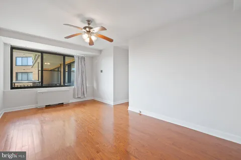 a view of an empty room with a window