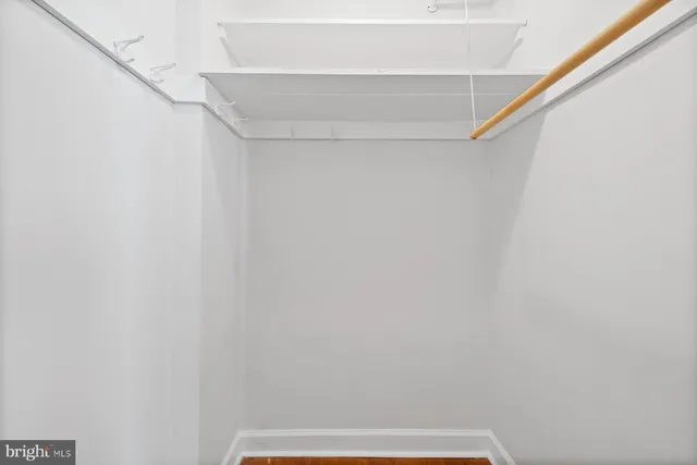 a view of small space with racks on the wall