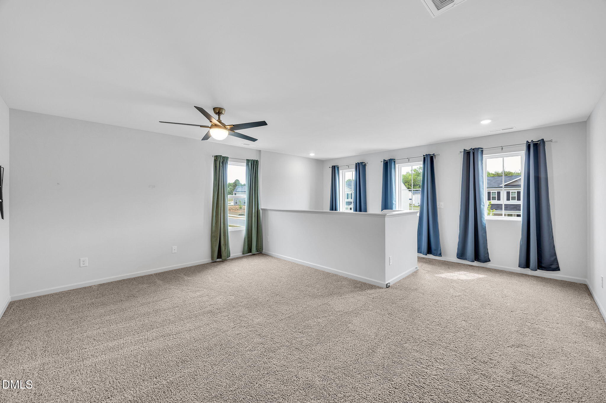 177 Yellowwood Avenue Spring Hope, NC 27882 - Photo 20 of 31 a view of a big room with windows and cabinet