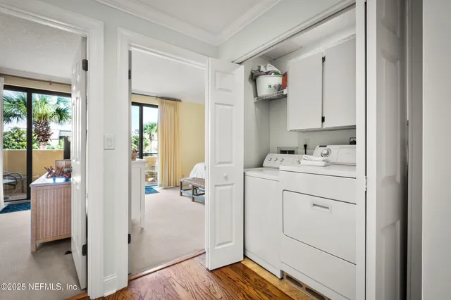 a bathroom with a toilet a sink and a mirror