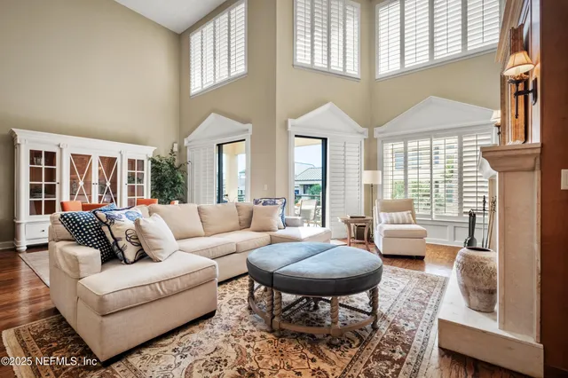 a living room with furniture and a table