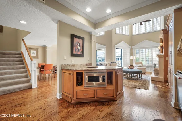 a living room with furniture or couch and a flat screen tv