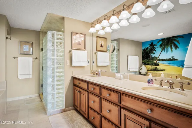 a view of living room with furniture and floor to ceiling window