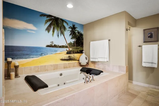 a view of a swimming pool and lounge chair