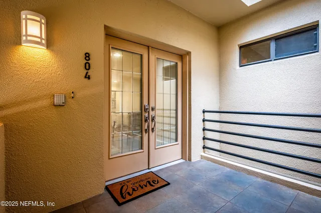 a bedroom with furniture and wooden floor