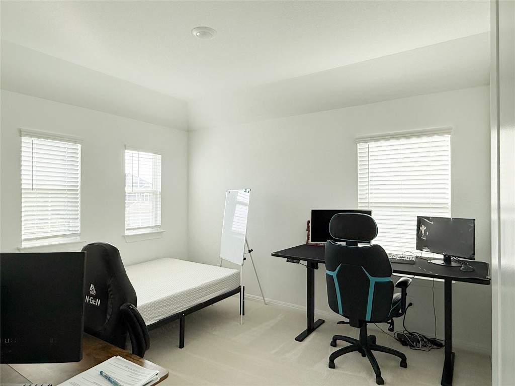 253 Inlet Lane Leander, TX 78641 - Photo 18 of 23 Office area with light colored carpet and baseboards